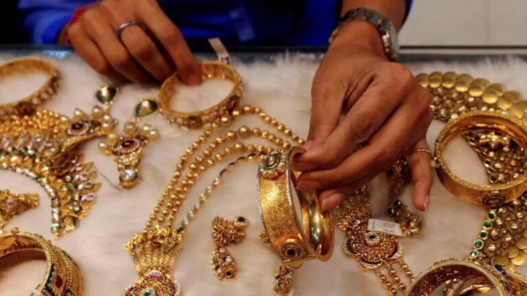 Gold trades flat at ₹82,400 per 10 gm; silver plunges ₹1,500
