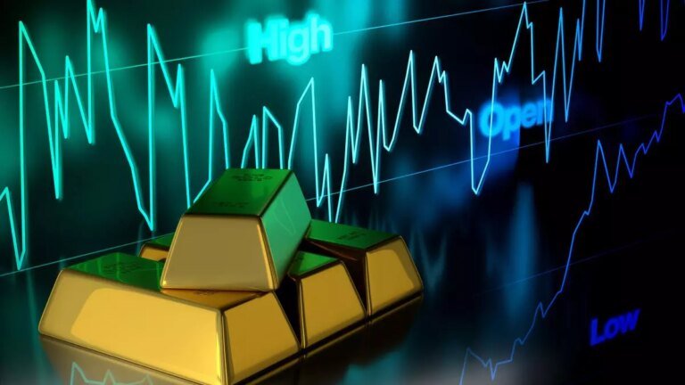 Gold rally capped by strengthening dollar, prices slip marginally