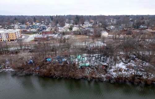 Elgin approves plan to move ‘Tent City’ residents to a hotel, tear down encampment