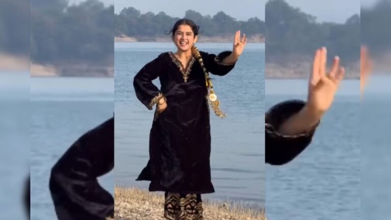 A girl wearing a black suit danced vigorously on a Punjabi song on the river bank, people went crazy for the dance.
