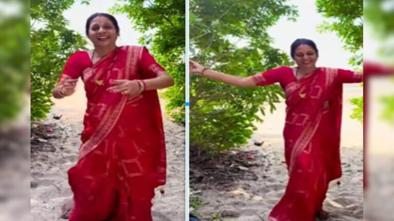 Aunty’s intoxicating dance on the beach, shows moves on her waist