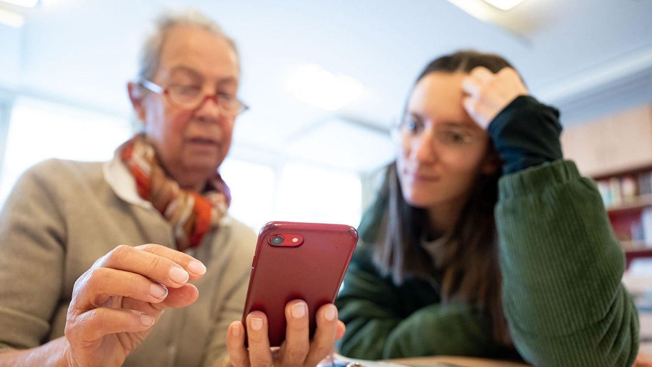 elderly-person-learning-about-phones.jpg