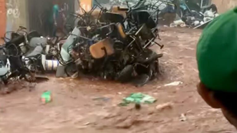Video: Brazil floods send torrent of waste down street | Floods