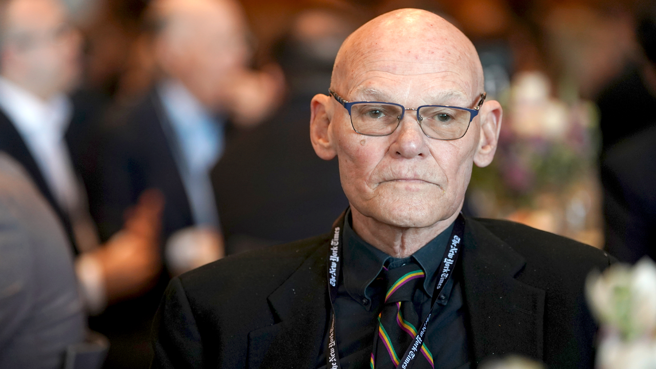 james-carville-sits-at-event.png