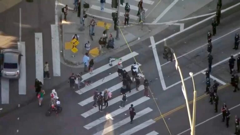 LA police issue dispersal order after student protest against ICE turns violent