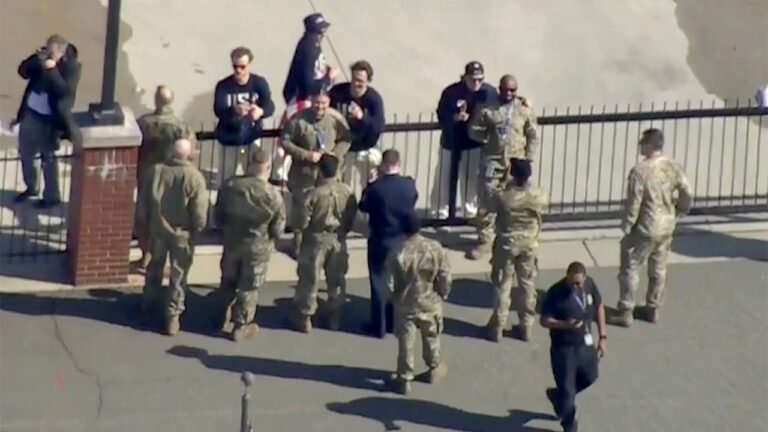US men’s hockey team shares medal moment with military before White House visit