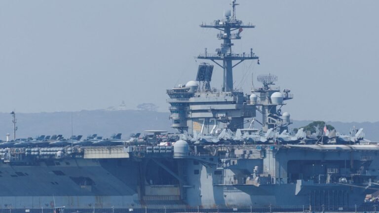 US aircraft carrier scrambles fighter jet to down ‘aggressive’ Iranian drone as tensions rise ahead of talks | US News