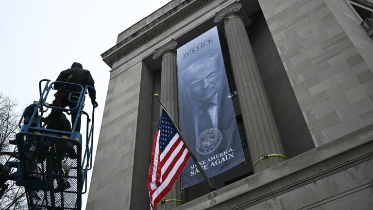 Trump DOJ banner sparks outrage from liberal officials