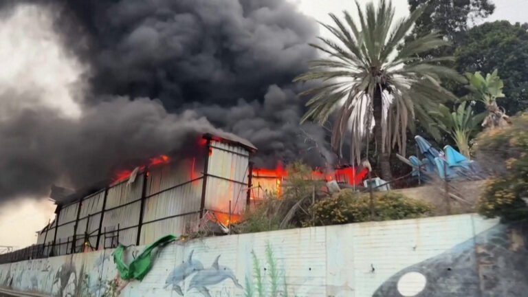 Iranian missile strike in central Israel sets building ablaze | Conflict