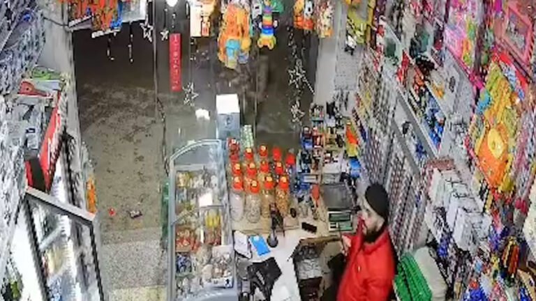 Moment Israeli soldier throws stun grenade at shop near Ramallah | Newsfeed