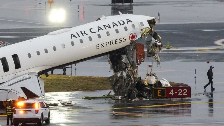 Video shows Air Canada jet hit fire truck at LaGuardia, killing 2 pilots