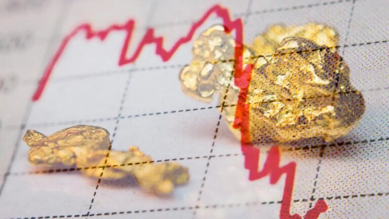 Gold falls over 1% as dollar firms, oil surge amid Iran tensions fuels inflation fears
