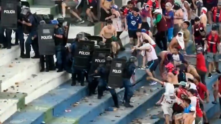 Fans fight police at Paraguay football match | Football