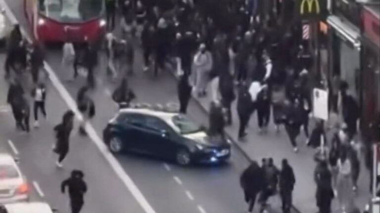 Two arrested after crowds of young people swarm London high street in social media ‘flash mob’ | UK News