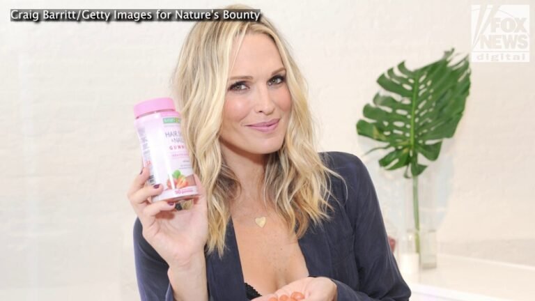 Molly Sims puts on a bikini and gets in the sand to dunk on those who told her modeling wouldn’t last forever