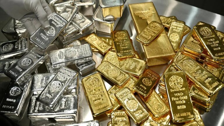 What’s driving gold to record highs as silver falls?