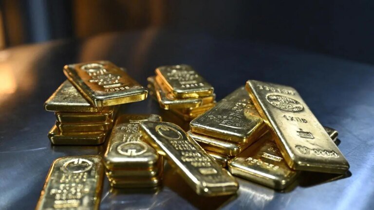 Gold rebounds from five-week low but inflation fears cap gains