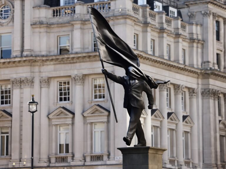 New Banksy sculpture appears to show politician blinded by his own flag | Arts and Culture
