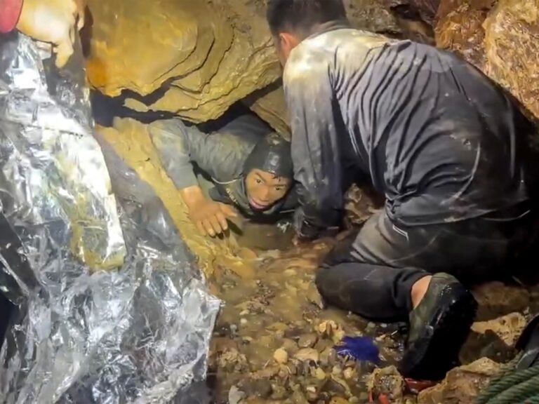 Rescuers race to save two people still trapped in cave in Laos | Floods News