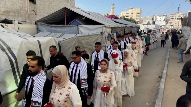 Mass wedding brings brief joy to couples in devastated Gaza | Gaza News