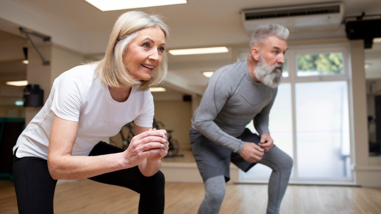 older-couple-squatting-workout.jpg