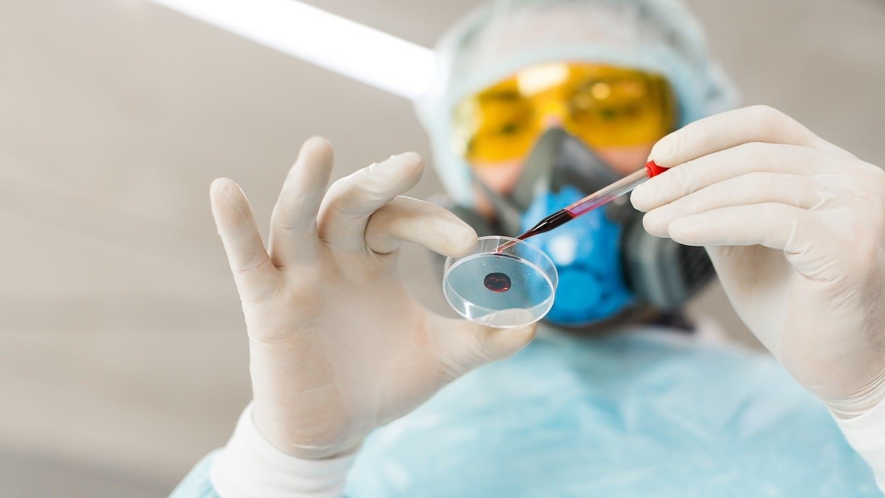 researcher-testing-blood-sample.jpg