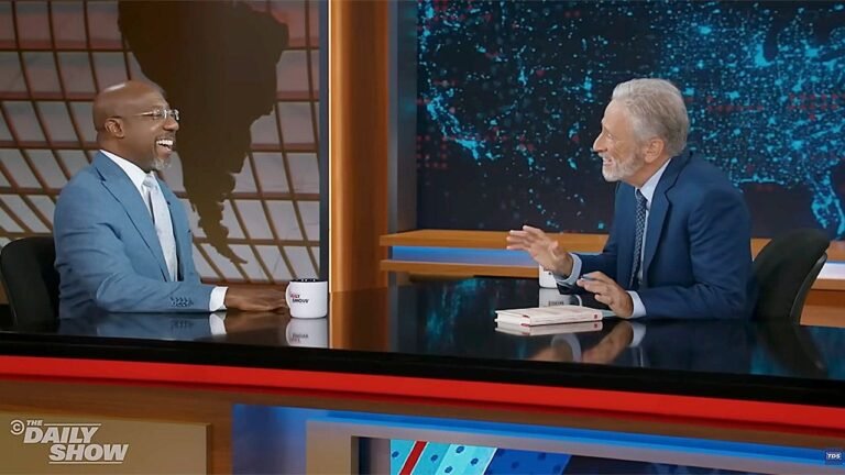 Raphael Warnock tells Jon Stewart he puts up with politics, doesn’t love it