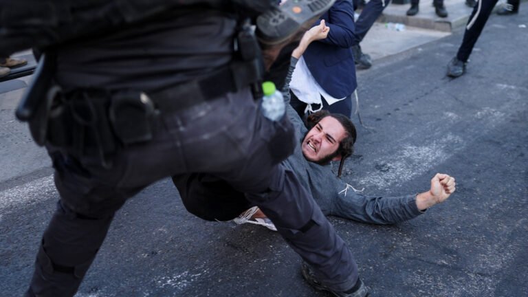 Ultra-Orthodox protesters clash with Israeli police over army draft | Protests